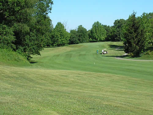 A view of the 11th green and fairway at La Fontaine Golf Club