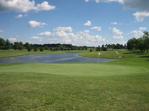 A view of a hole protected by a pond at Willows 9 from Winchester Golf Club