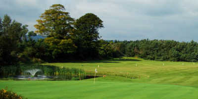 A view of a green with water coming into play at Kilcoole Golf Club
