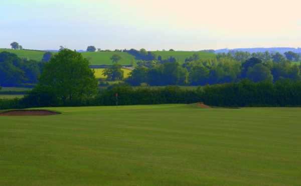 A view from fairway at Newbold Comyn Golf Course