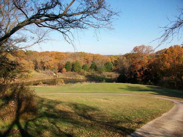 A fall view of a hole with water coming into play at Buncombe Creek Golf Course