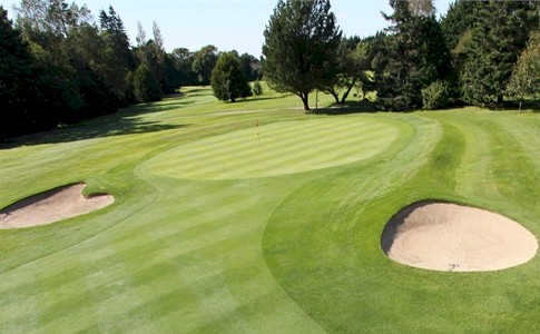 A view of a hole flanked by bunkers at Foxrock Golf Club