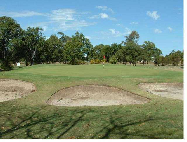 A view of the 7th green protected by bunkers at Bundaberg Golf Club