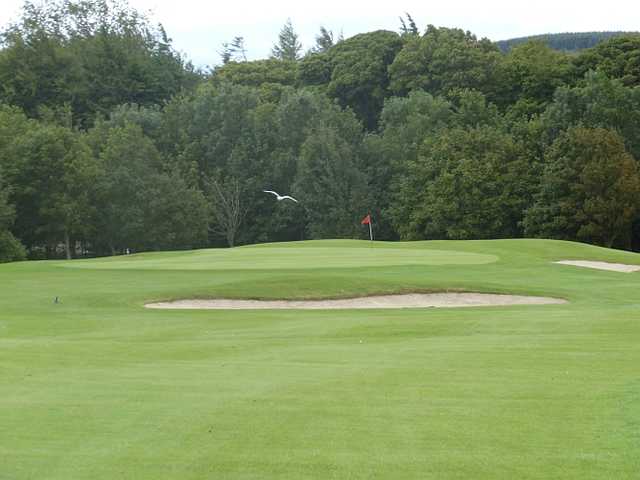 A view of a green protected by bunkers at Glencullen Golf Club.