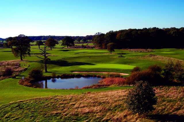 A view of a green with water coming into play at Whittlebury Park Golf & Country Club.