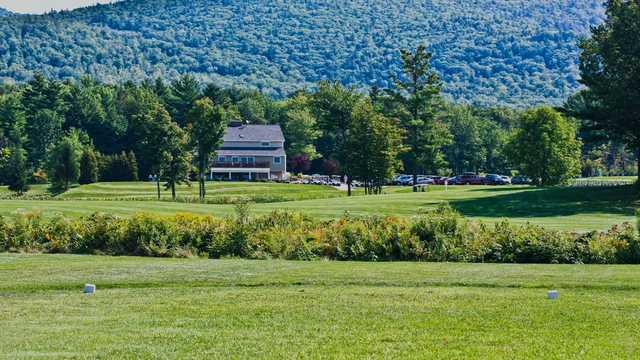 A view from a tee and the clubhouse in background at Birch Hill Country Club.
