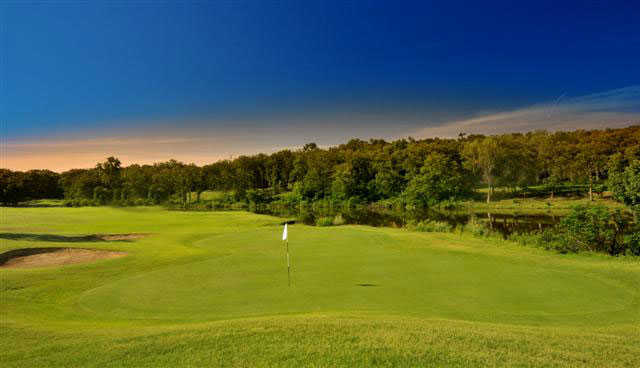 A view of a hole protected by sand traps at Stone Creek from Page Belcher Golf Course
